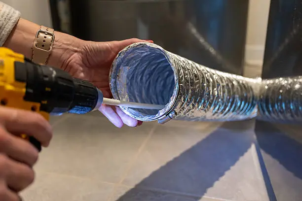 Dryer vent cleaning in Turlock with drill brush