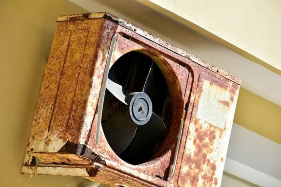Rusted outdoor AC unit showing why air conditioning installation in California may be needed