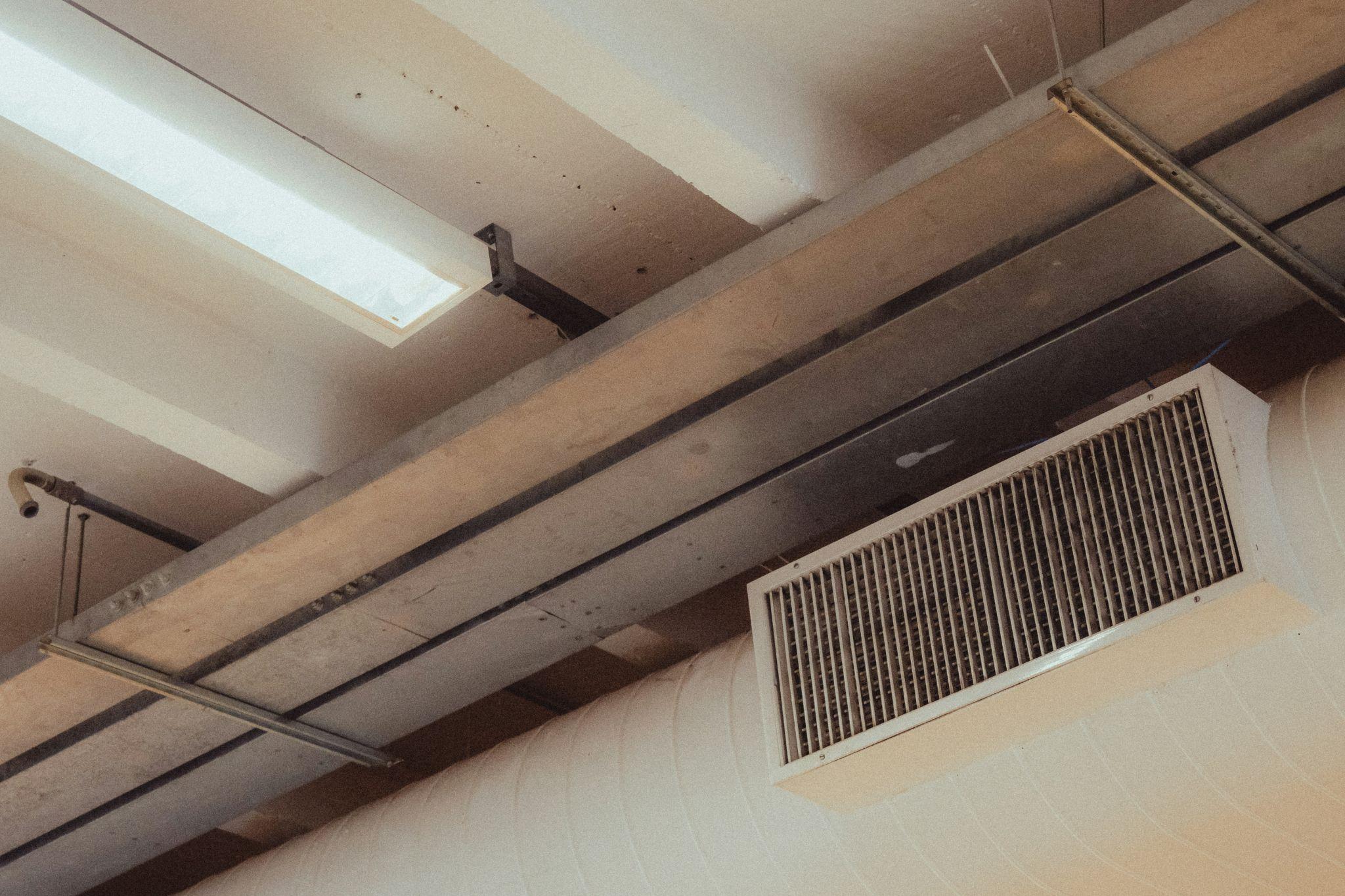 Air duct cleaning in California for a residential HVAC system.