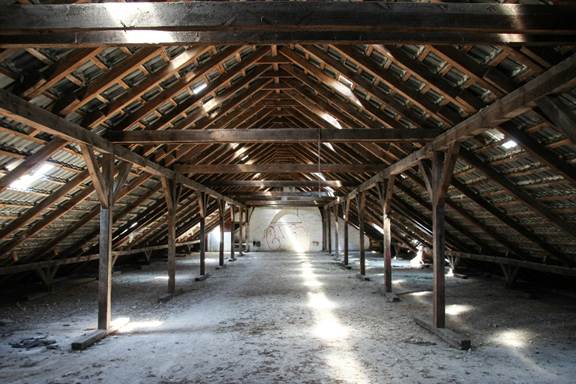 Attic insulation contractors in California inspecting attic insulation