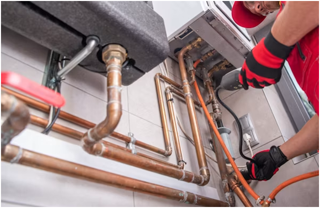 HVAC contractor in California performing maintenance